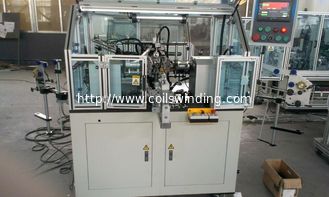 Hooked commutator armature winding machine